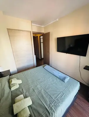 Cama o camas de una habitación en Simpático piso con 2 piscinas y vistas al mar