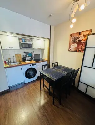 Una cocina o zona de cocina en Simpático piso con 2 piscinas y vistas al mar