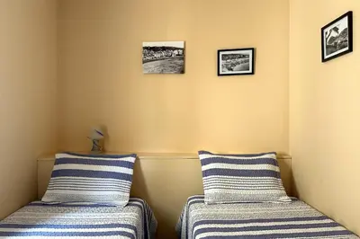 Cama o camas de una habitación en LETS HOLIDAYS Big terrace and bbq apartment