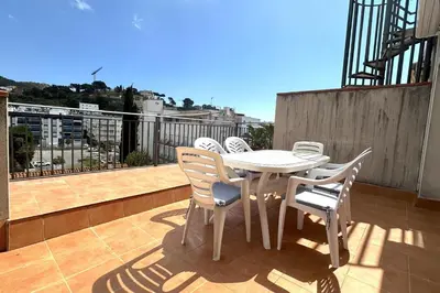 Un balcón o terraza de LETS HOLIDAYS Big terrace and bbq apartment