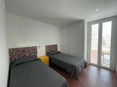 Cama o camas de una habitación en Apartament Cervantes