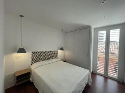 Cama o camas de una habitación en Apartament Cervantes