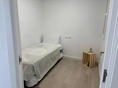 Cama o camas de una habitación en La Sardineta, es un apartamento en la Costa Brava, Palamós 1 minuto de la playa Alquiler temporal mínimo 32 noches