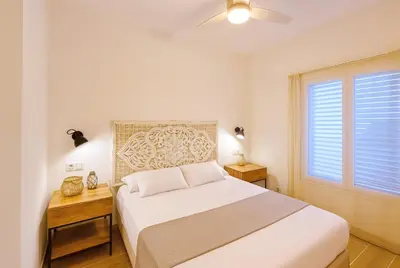 Cama o camas de una habitación en Apartamento con Jardín a 30 segundos de la playa