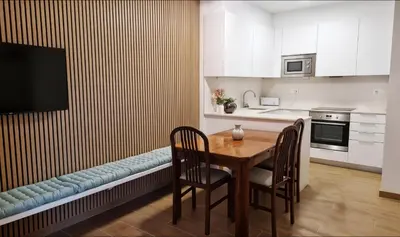 Una cocina o zona de cocina en Apartamento con Jardín a 30 segundos de la playa