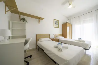 Cama o camas de una habitación en HomeHolidaysRentals Olai - Costa Barcelona