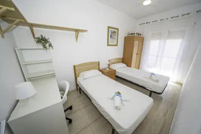 Cama o camas de una habitación en HomeHolidaysRentals Olai - Costa Barcelona