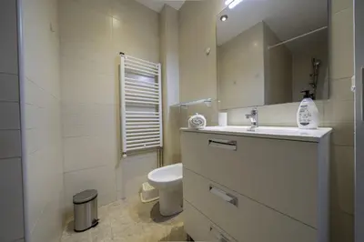 Un baño de HomeHolidaysRentals Olai - Costa Barcelona
