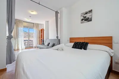 Cama o camas de una habitación en Hauzify I Apartaments Bellaire