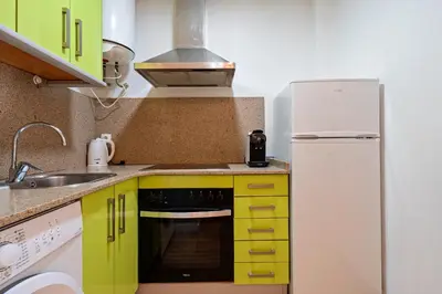 Una cocina o zona de cocina en Hauzify I Apartaments Bellaire