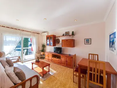 Una televisión o centro de entretenimiento en Apartment Costa Brava, SEAview! Nearby beach Lloret de Mar