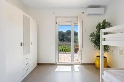 Cama o camas de una habitación en Hauzify I Can Moiset