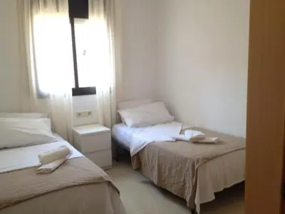 Cama o camas de una habitación en Vicmar Home Apartment I