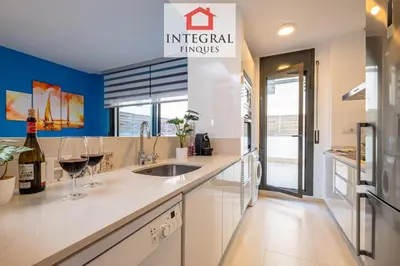 Una cocina o zona de cocina en Oasis Marítim