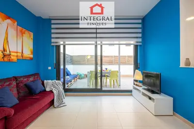 Una televisión o centro de entretenimiento en Oasis Marítim