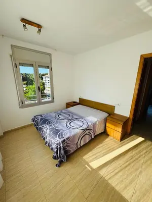 Cama o camas de una habitación en Magnífico piso con piscina y terraza grande cerca de la playa