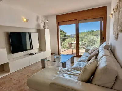Una televisión o centro de entretenimiento en EVH-113 Casa Martina
