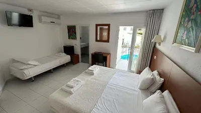 Cama o camas de una habitación en Hotel Sant March
