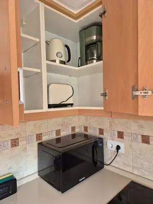 Una cocina o zona de cocina en Gran terrassa al cantó del mar