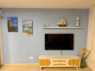Una televisión o centro de entretenimiento en Petit Paradís