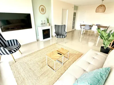 Una televisión o centro de entretenimiento en Hauzify I Apartament Grumet