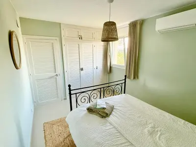 Cama o camas de una habitación en Hauzify I Apartament Grumet