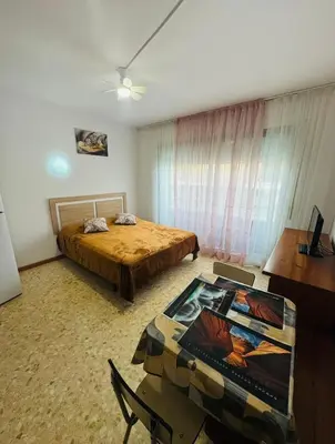 Cama o camas de una habitación en Confortable piso con 2 piscinas cerca de la playa