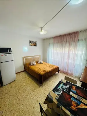 Cama o camas de una habitación en Confortable piso con 2 piscinas cerca de la playa