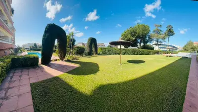 Jardín al aire libre en Confortable piso con 2 piscinas cerca de la playa
