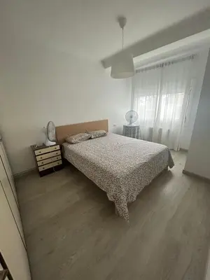 Cama o camas de una habitación en BRAVAHOLIDAYS-420-COLON, 2nd LINE BEACH, WIFI