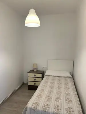 Cama o camas de una habitación en BRAVAHOLIDAYS-420-COLON, 2nd LINE BEACH, WIFI