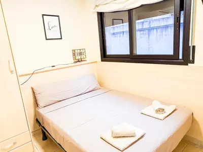 Cama o camas de una habitación en Ideal Aparmennts