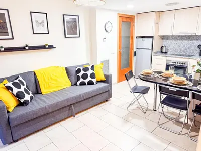 Zona de estar de Ideal Aparmennts