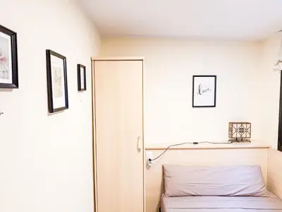 Cama o camas de una habitación en Ideal Aparmennts