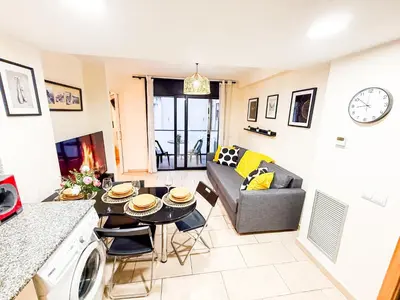 Zona de estar de Ideal Aparmennts