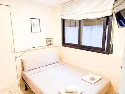 Cama o camas de una habitación en Ideal Aparmennts