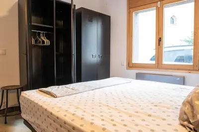 Cama o camas de una habitación en casa nueva de pueblo con piscina y barbacoa