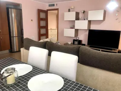 Una televisión o centro de entretenimiento en Vivalidays - Estrella de Mar - Calella