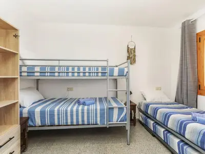 Cama o camas de una habitación en Apartment RieraMar by Interhome
