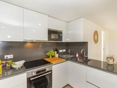 Una cocina o zona de cocina en Apartment El Fenua by Interhome