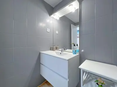 Un baño de Beachfront gateway in Pineda de Mar