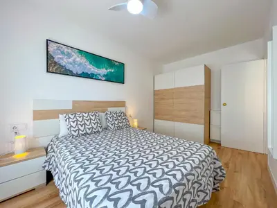 Cama o camas de una habitación en Beachfront gateway in Pineda de Mar
