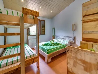 Cama o camas de una habitación en Villa in Palafolls with Private Pool & BBQ