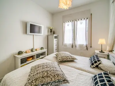 Cama o camas de una habitación en Apartment in Calella near the Beach