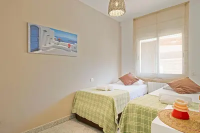 Cama o camas de una habitación en Winahost Apartamento Palamós