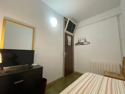 Cama o camas de una habitación en Pensión Borràs