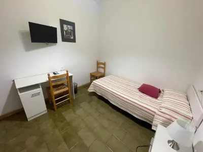 Cama o camas de una habitación en Pensión Borràs