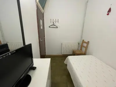 Cama o camas de una habitación en Pensión Borràs