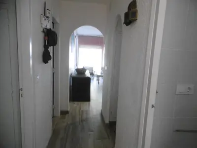 Una televisión o centro de entretenimiento en Bonito apartamento con terraza y magnificas vistas