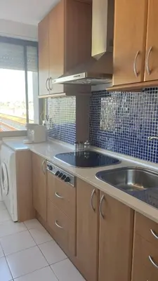 Una cocina o zona de cocina en Maravilloso apartamento Delux